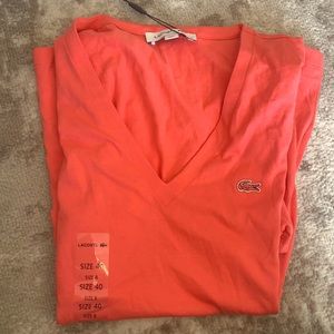 Lacoste short sleeve pink v neck. Never worn, NWT